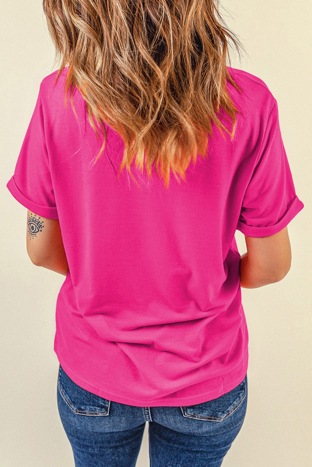 Back view of pink T-shirt, round neck, short sleeves