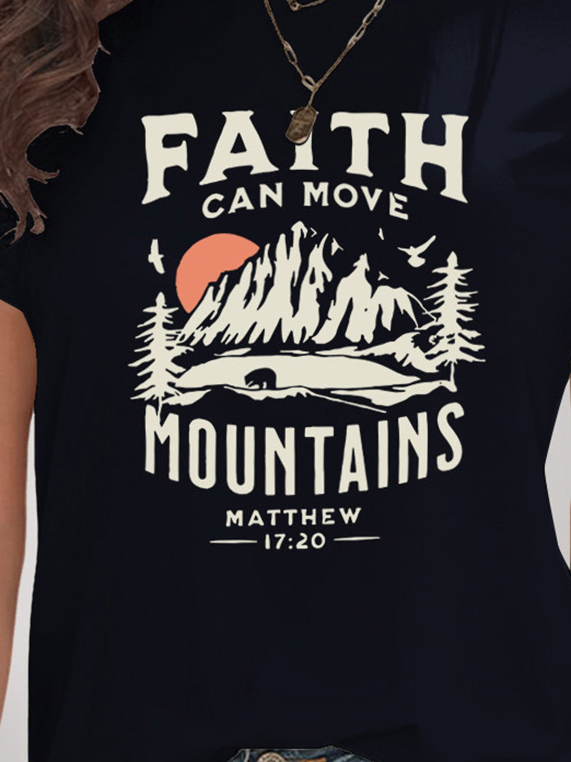 Close-up of navy t-shirt mountain graphic