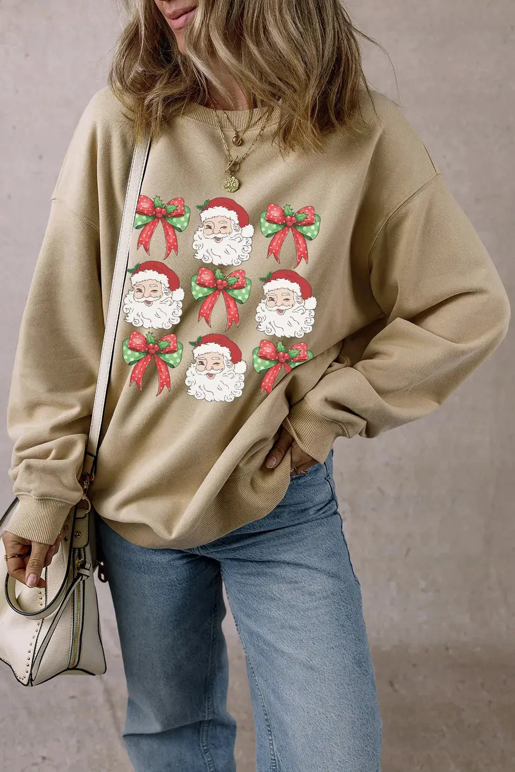 Santa graphic sweatshirt styled with jeans