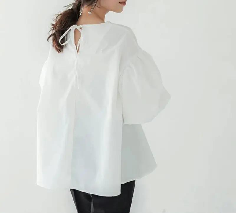 White lantern sleeve shirt back view