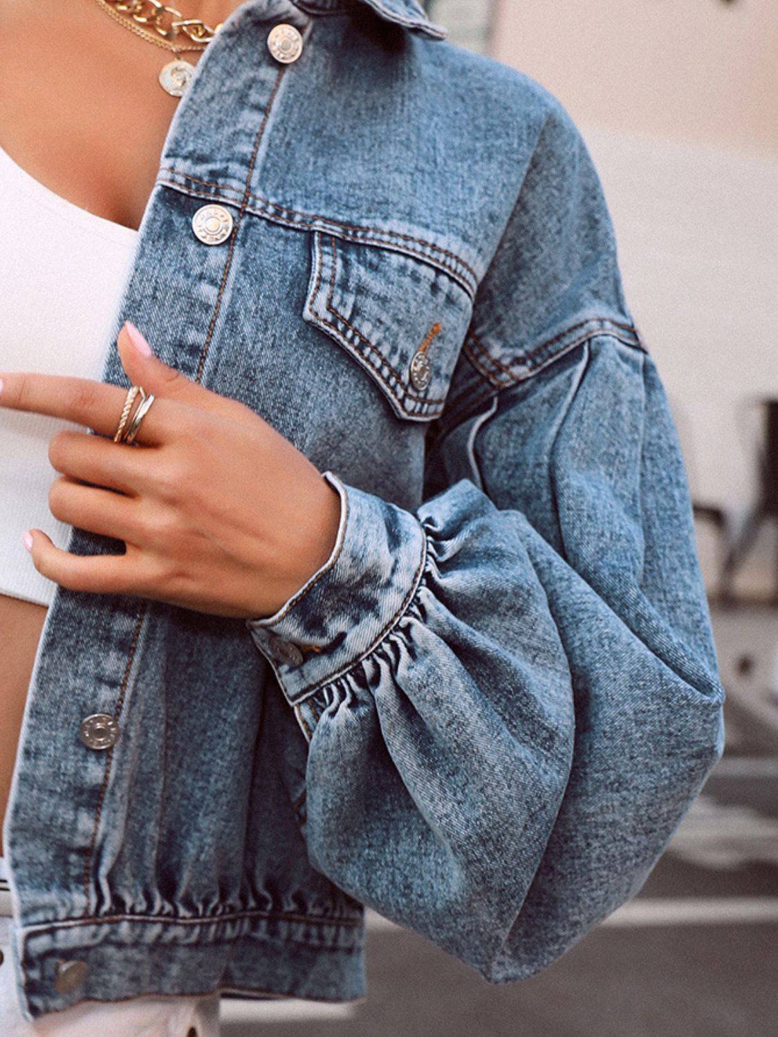 Close-up of denim top with button details