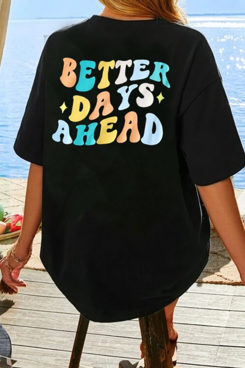 Black T-shirt featuring &