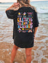 Black T-shirt with colorful gratitude graphic on back