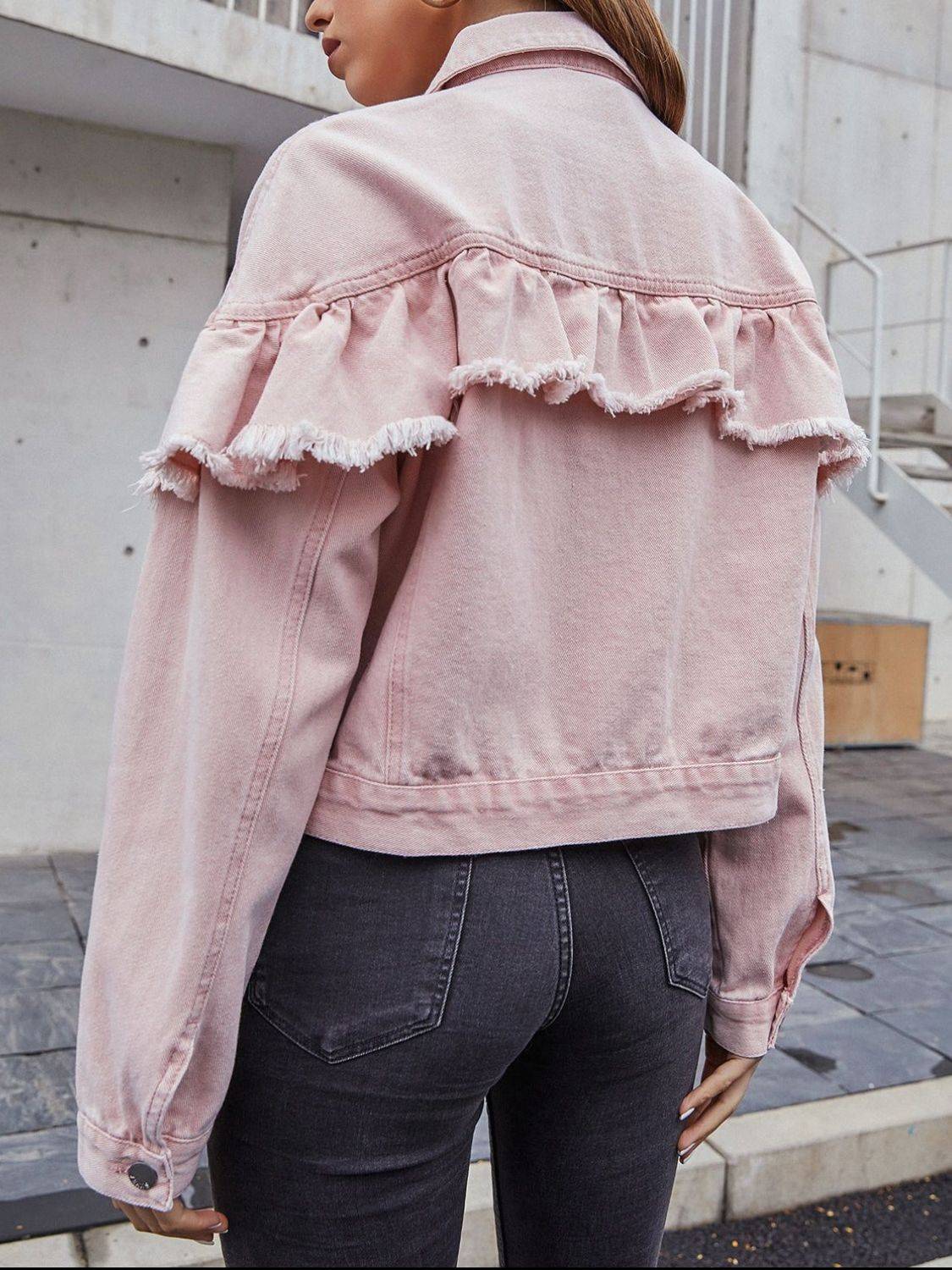 Back view of pink denim jacket with ruffled detail