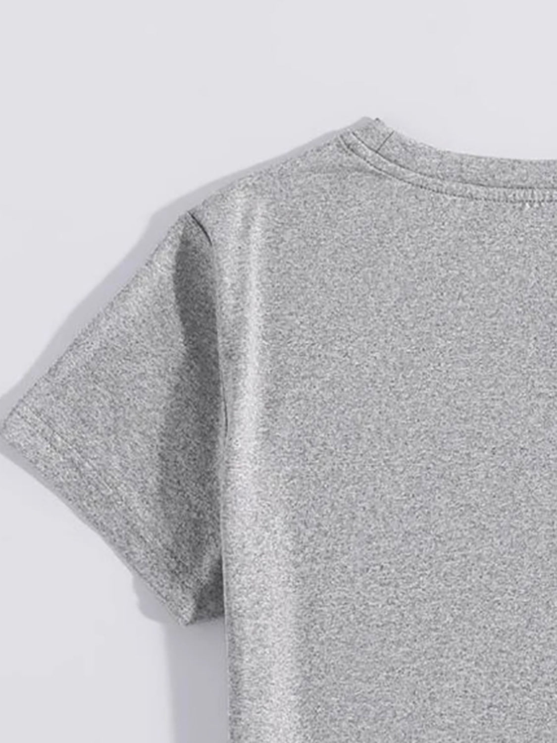 Close-up of gray T-Shirt sleeve
