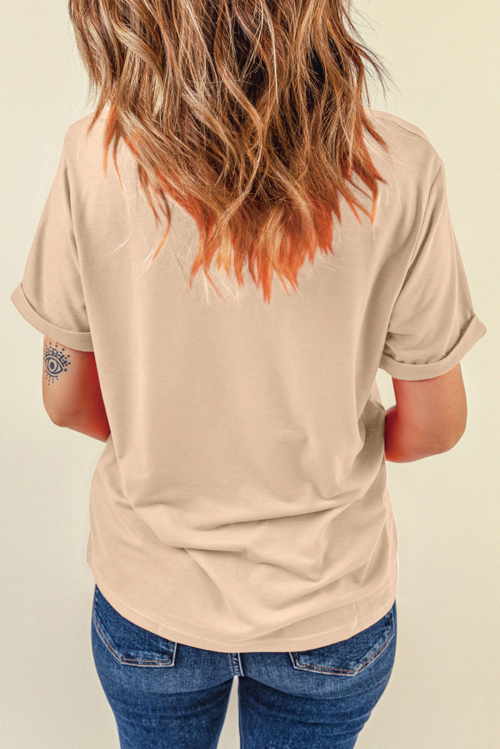 Back view of plain beige T-shirt