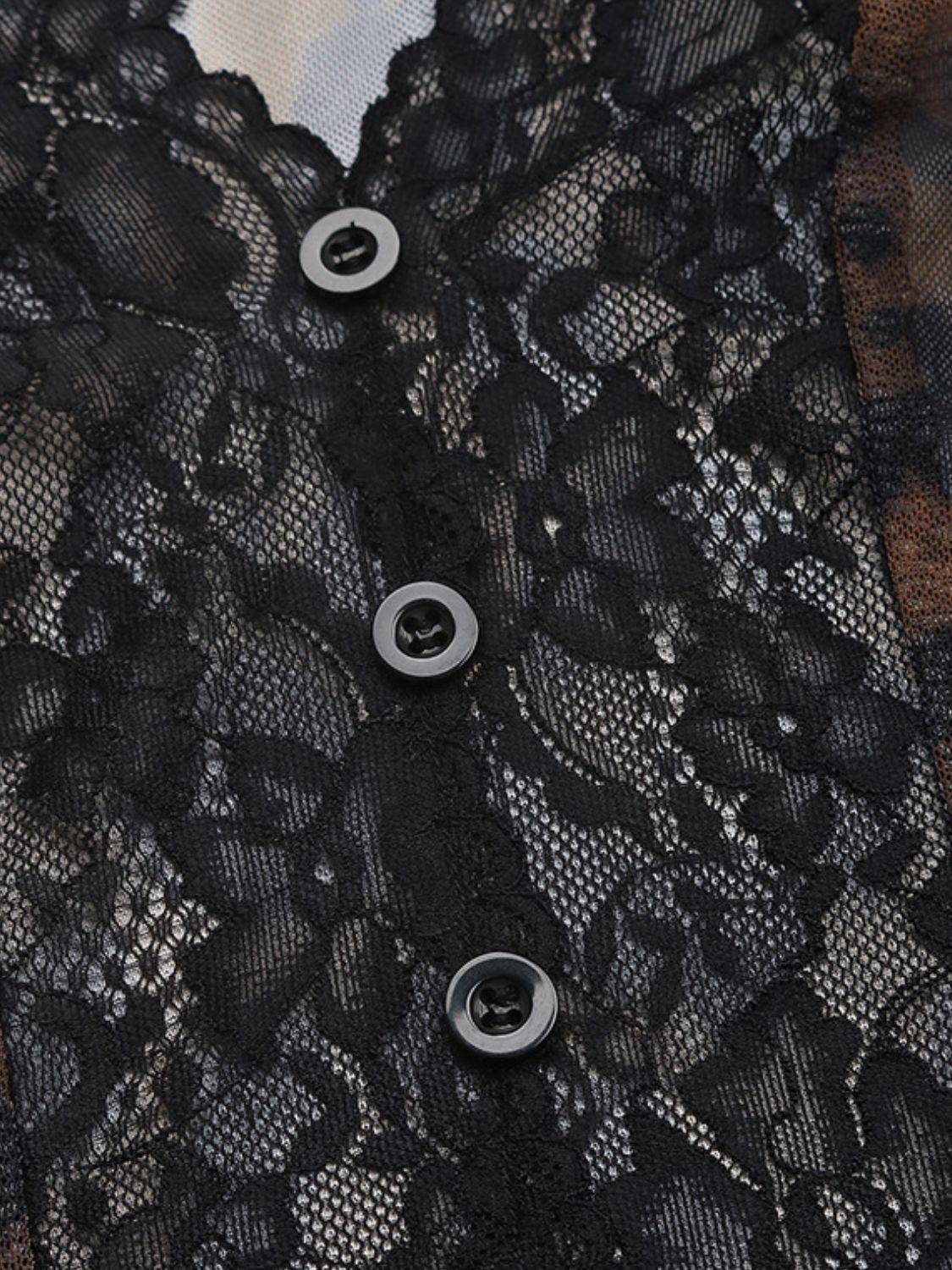 Close-up of lace and button details on bodysuit
