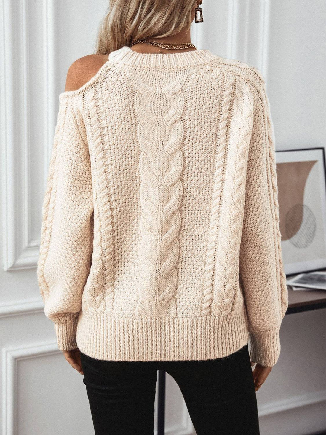 Beige cable knit cold shoulder sweater, back view