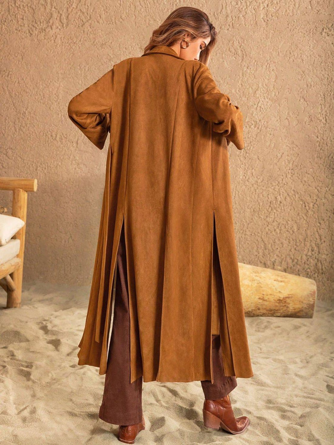 Back view of brown slit tied collared neck longline coat