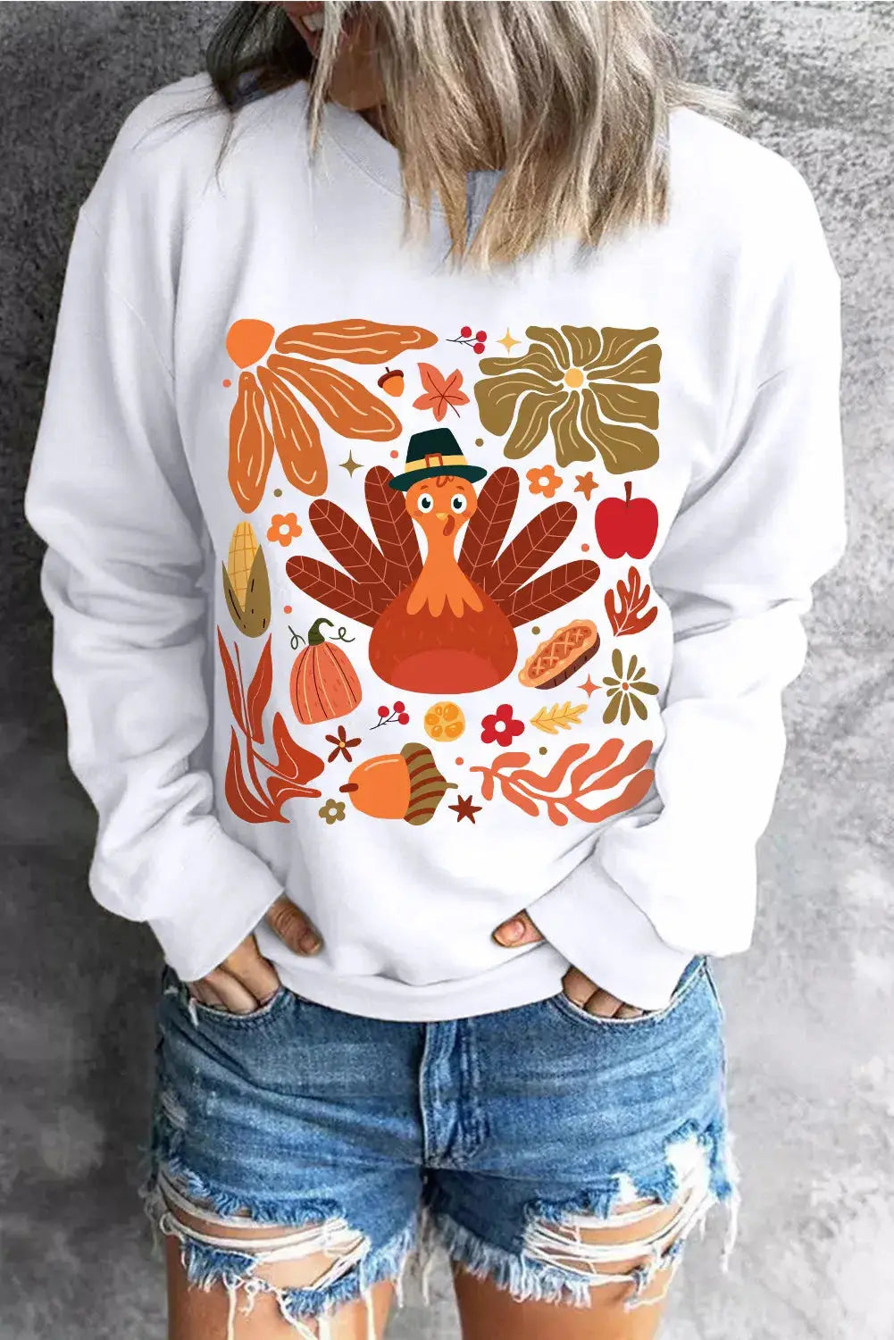 White sweatshirt with turkey and autumn graphics, long sleeves