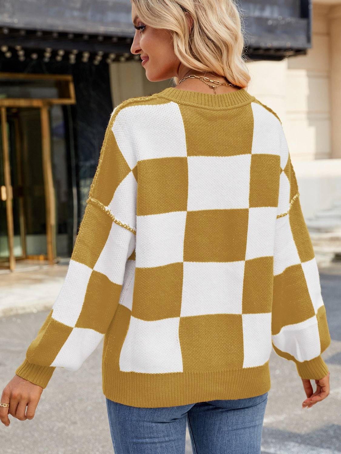 Back view of yellow and white checkered sweater