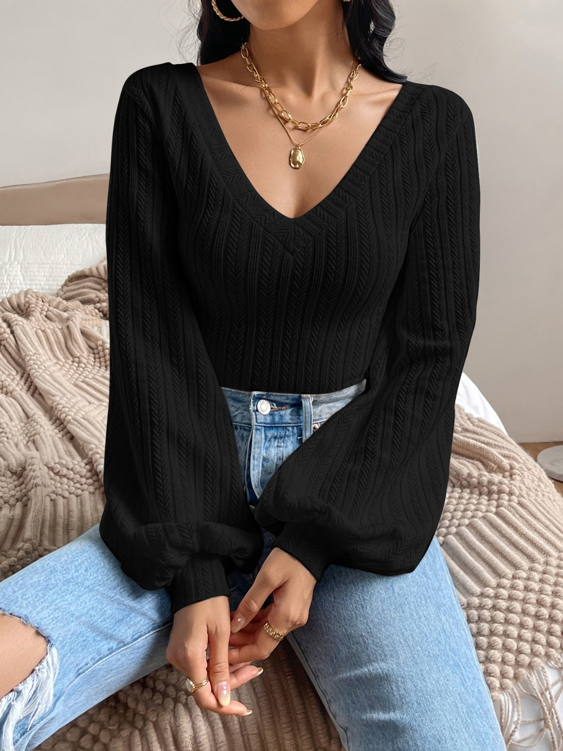 Honey V-Neck Long Sleeve T-Shirt in black, seated pose
