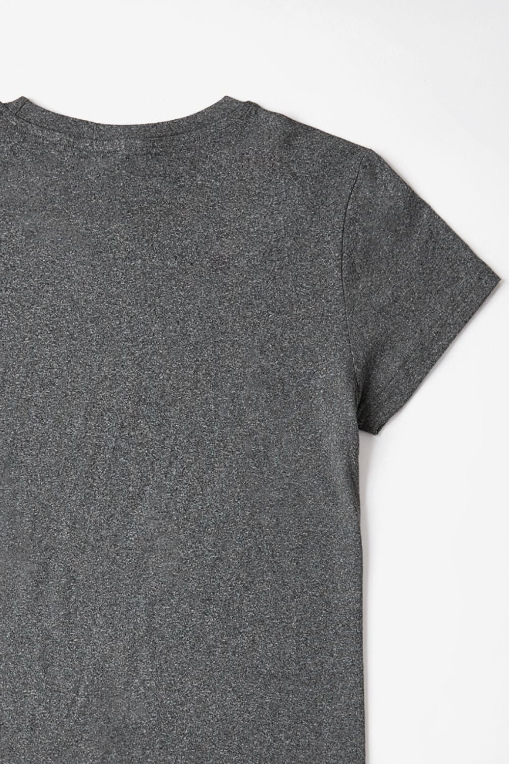 Close-up of charcoal t-shirt fabric and stitching