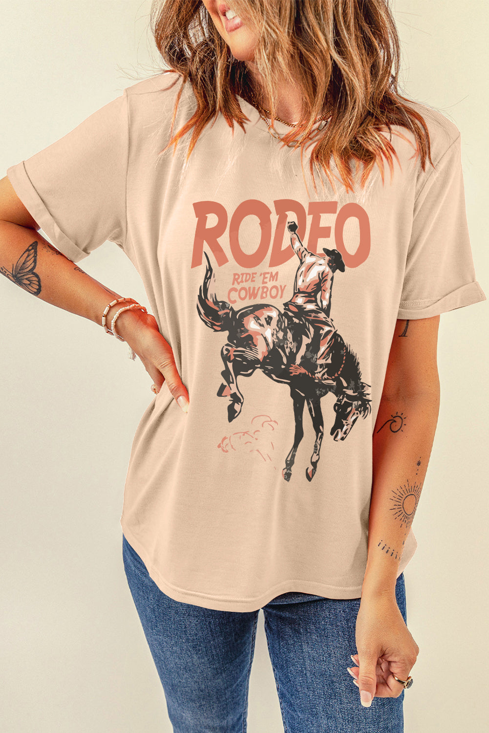 Beige cowboy graphic round neck t-shirt, short sleeves.