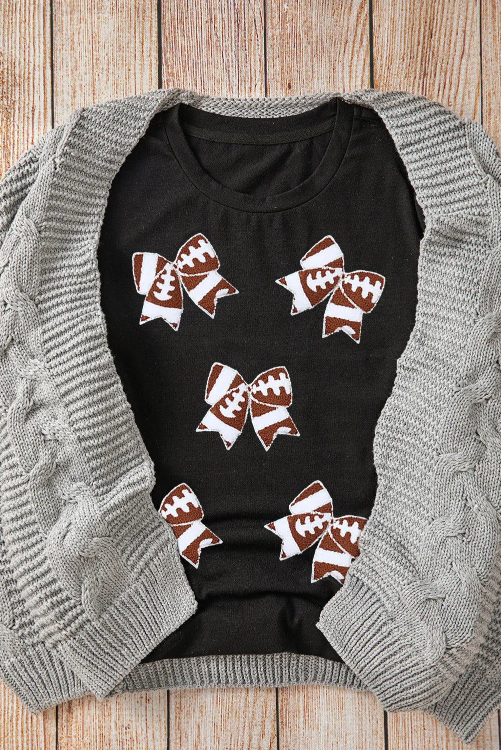 T-shirt with bows styled with gray cardigan