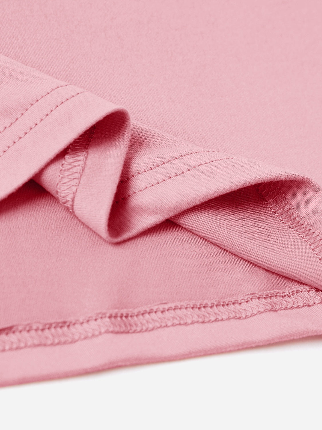 Close-up of pink T-shirt fabric and stitching