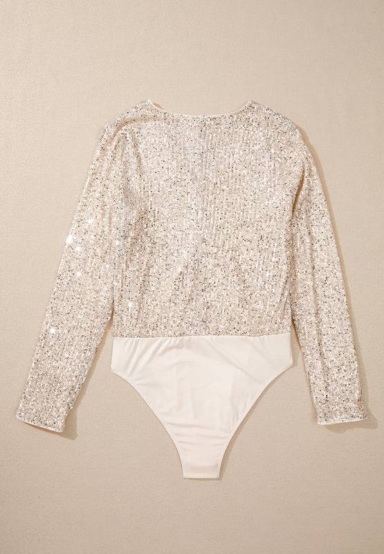 Back of sequin bodysuit laid flat on surface