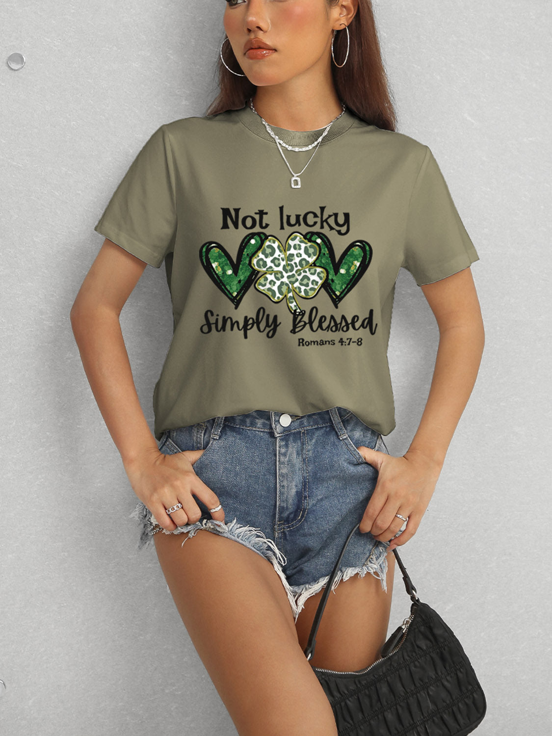 Olive T-shirt featuring Romans 4:7-8 text