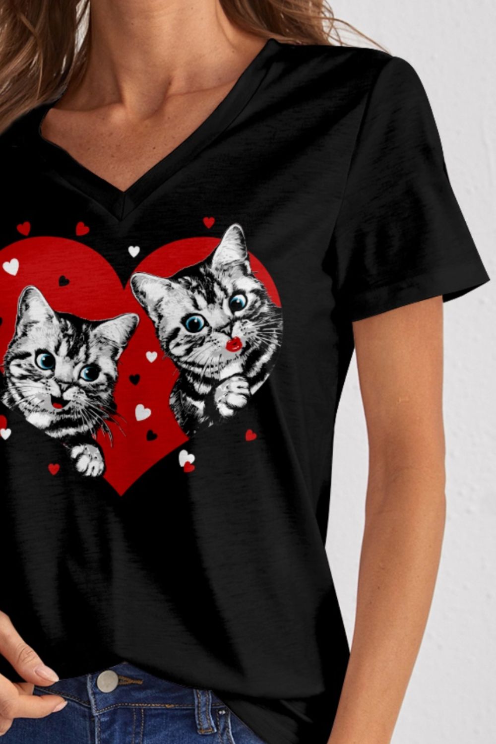 Close-up of cat design on FAM-FAM V-Neck T-Shirt