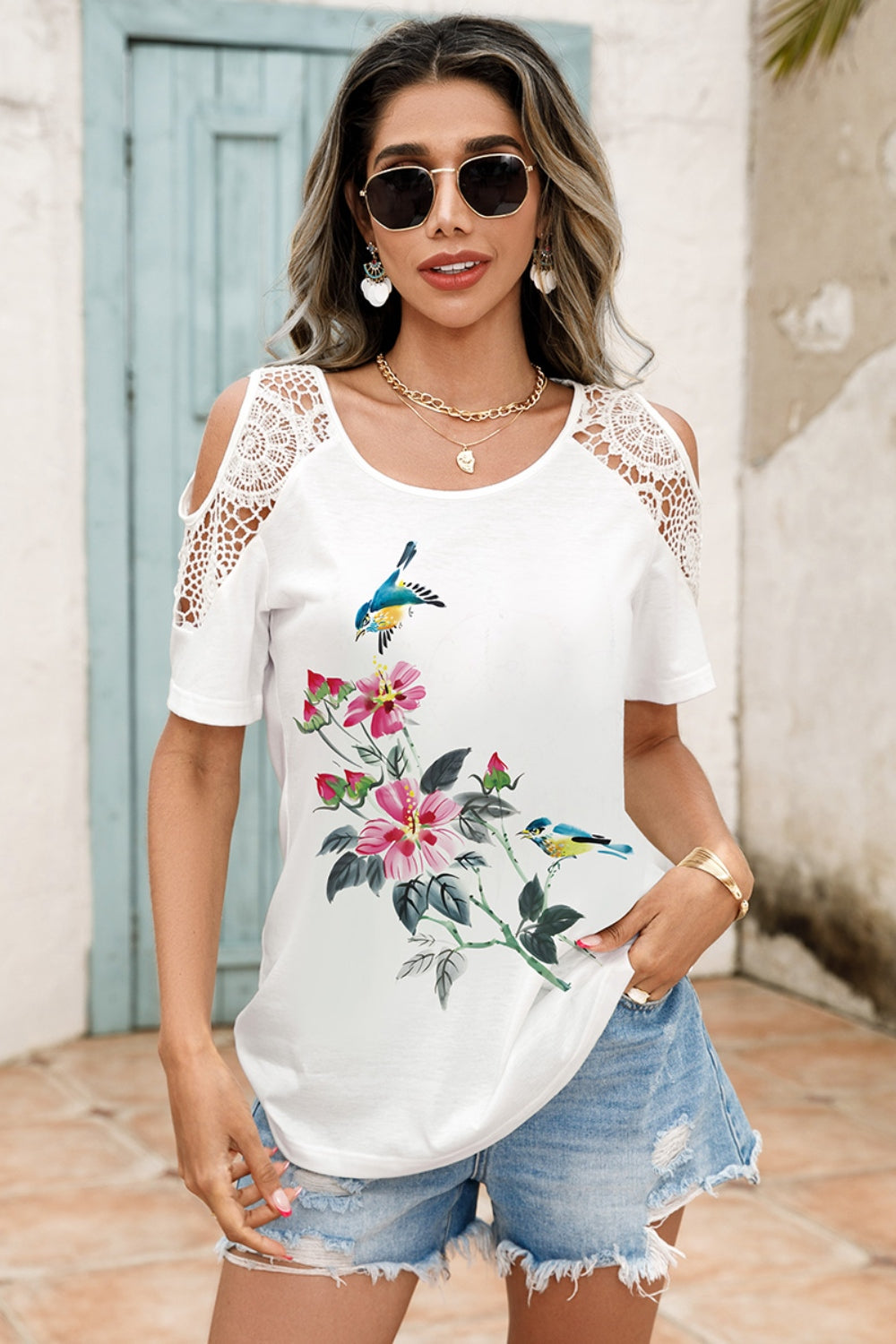 Back view of rose print lace cold shoulder blouse
