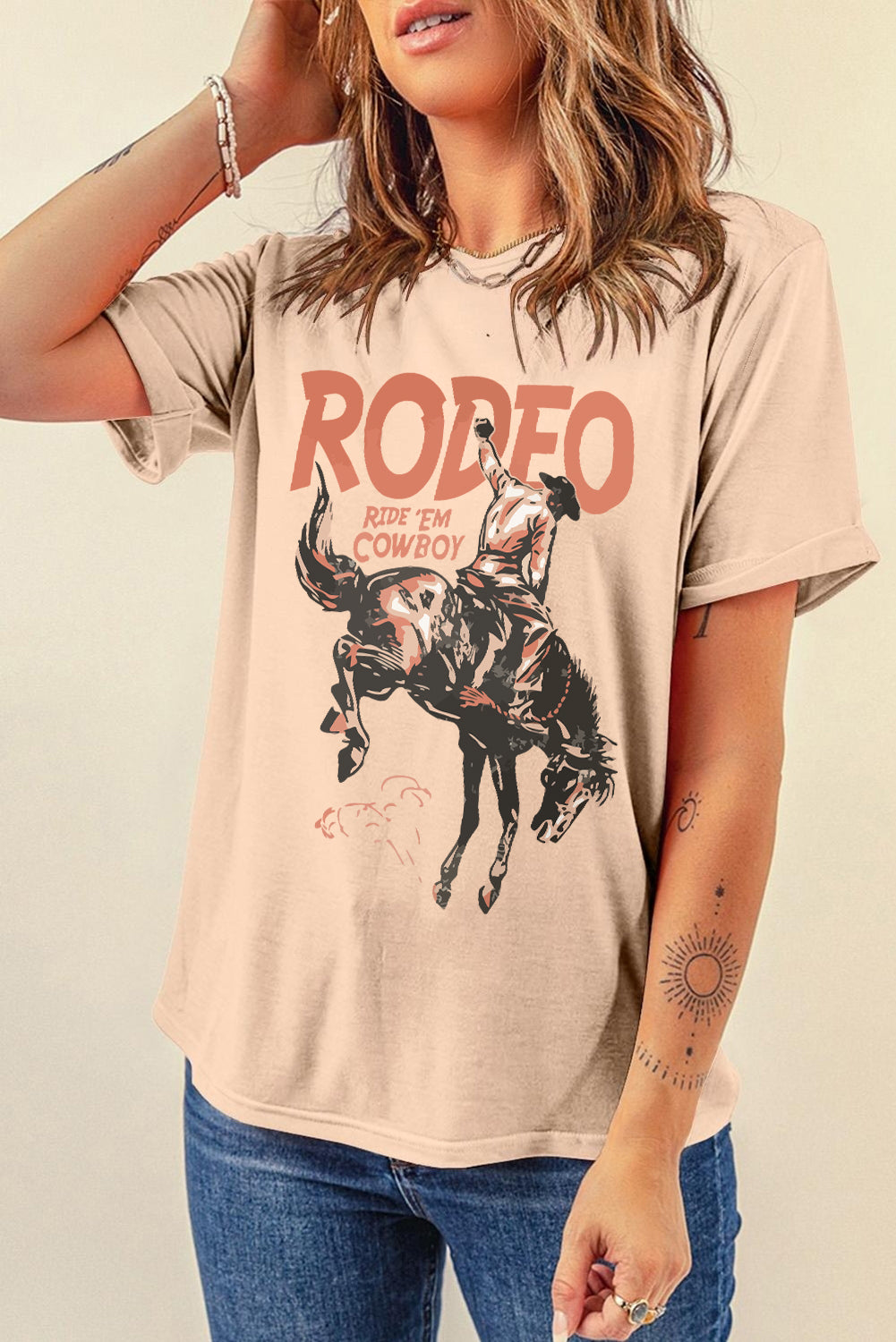 Beige cowboy graphic round neck t-shirt, short sleeves.