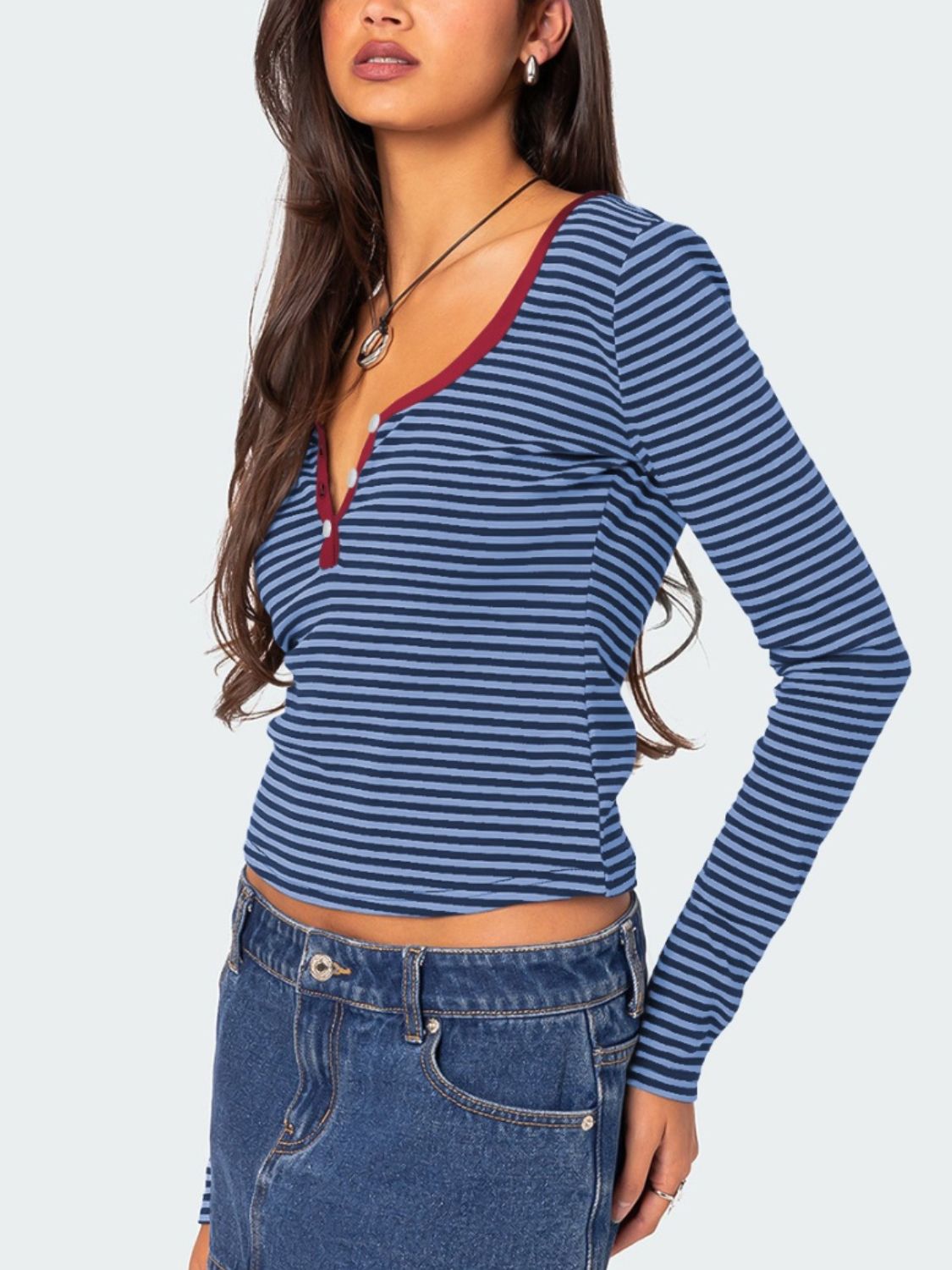 Back view of navy and white striped T-shirt with maroon trim