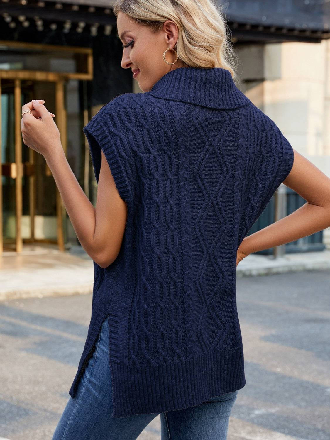 Back view of navy turtleneck sweater vest