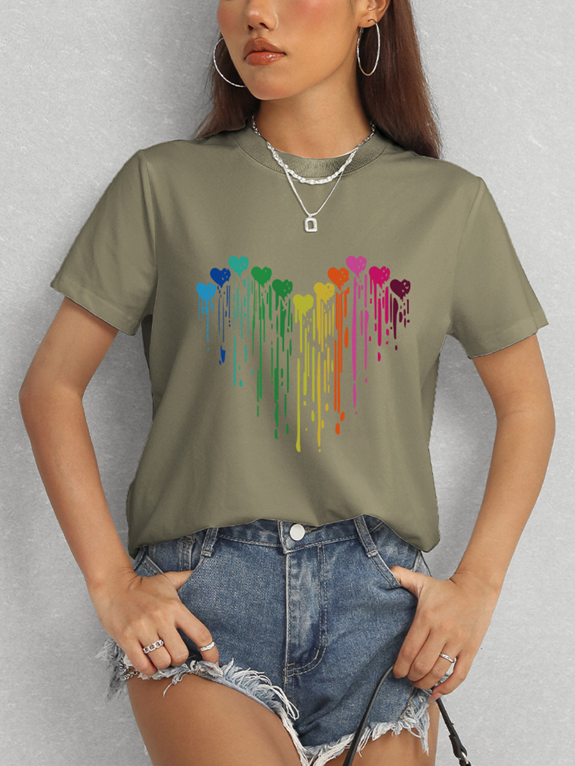 Olive t-shirt with rainbow heart design and short sleeves