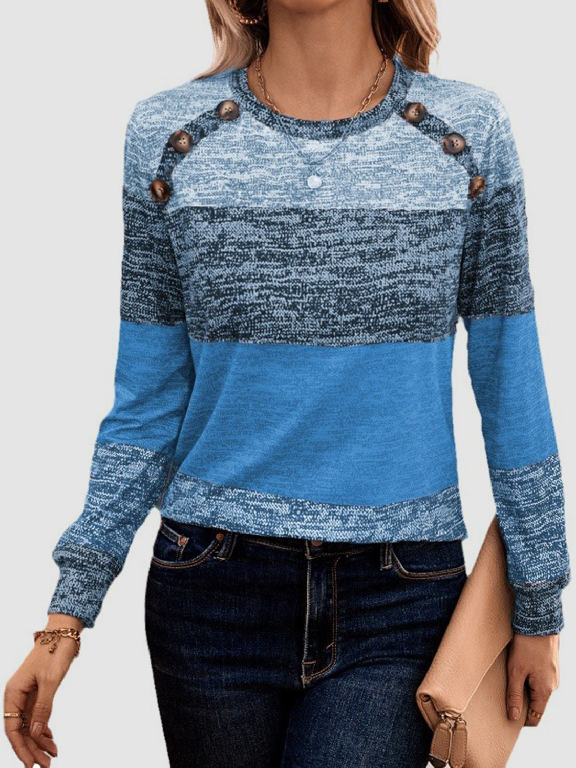 Blue decorative button contrast round neck T-shirt with handbag.