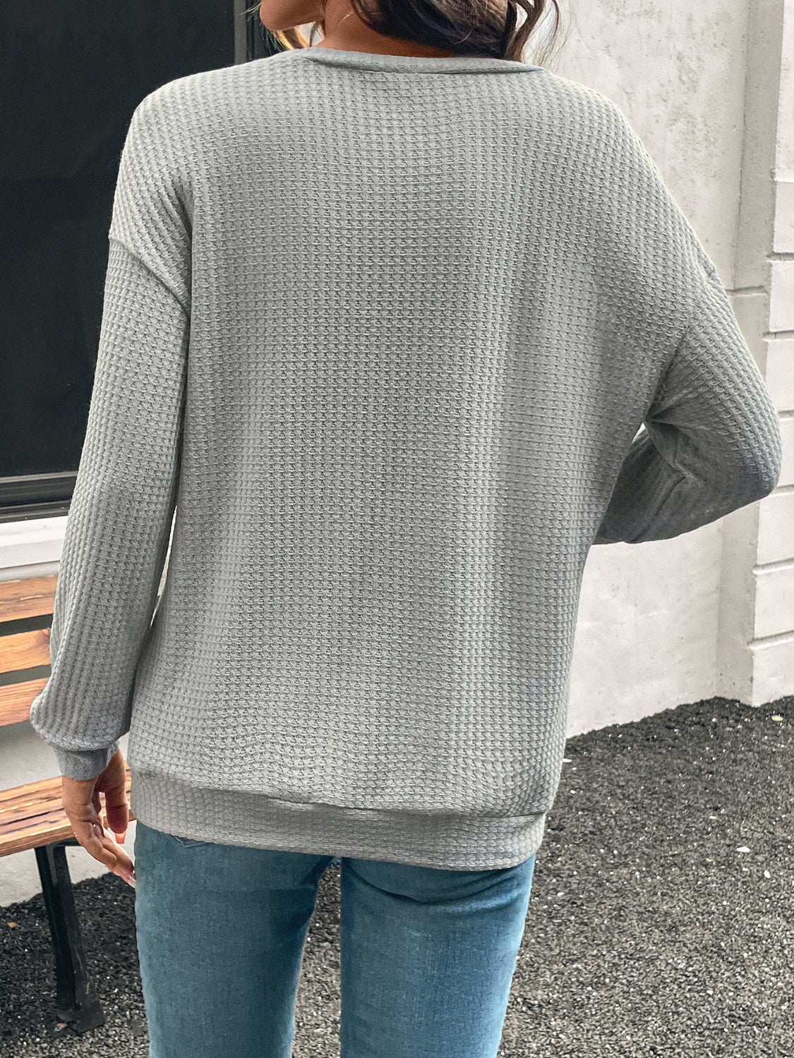 Back view of gray dropped shoulder long sleeve t-shirt