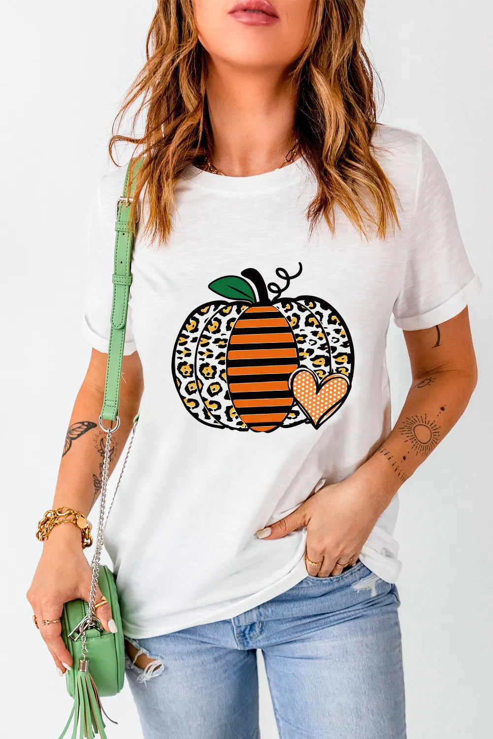 Pumpkin graphic T-shirt with rolled sleeves, front view