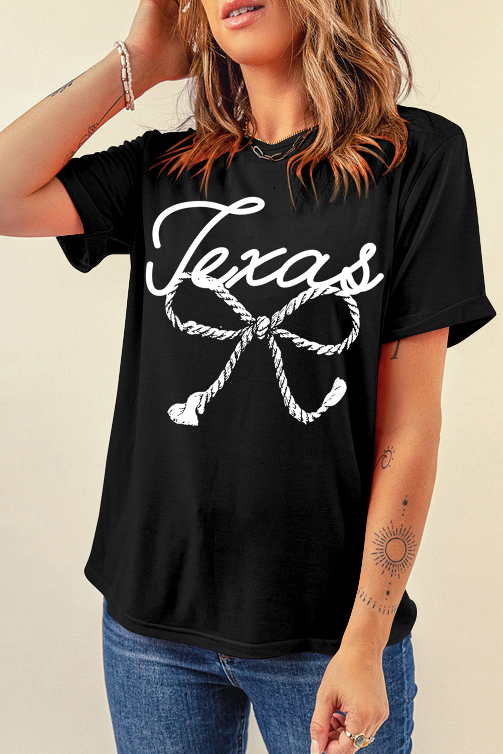 Black graphic round neck T-shirt with Texas rope design