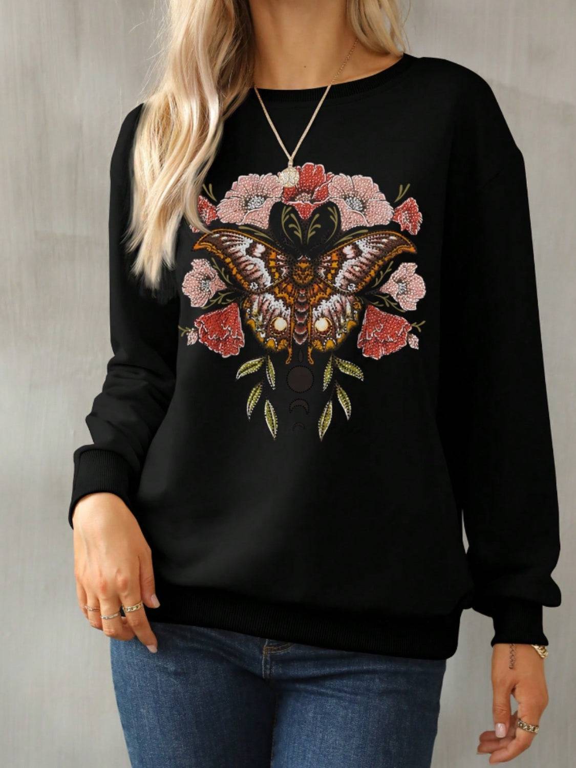 Butterfly and floral graphic sweatshirt front view