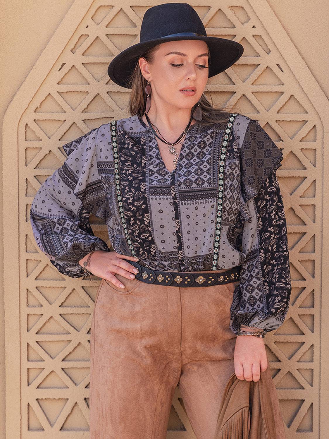 Stylish ruffled blouse with printed design and long sleeves