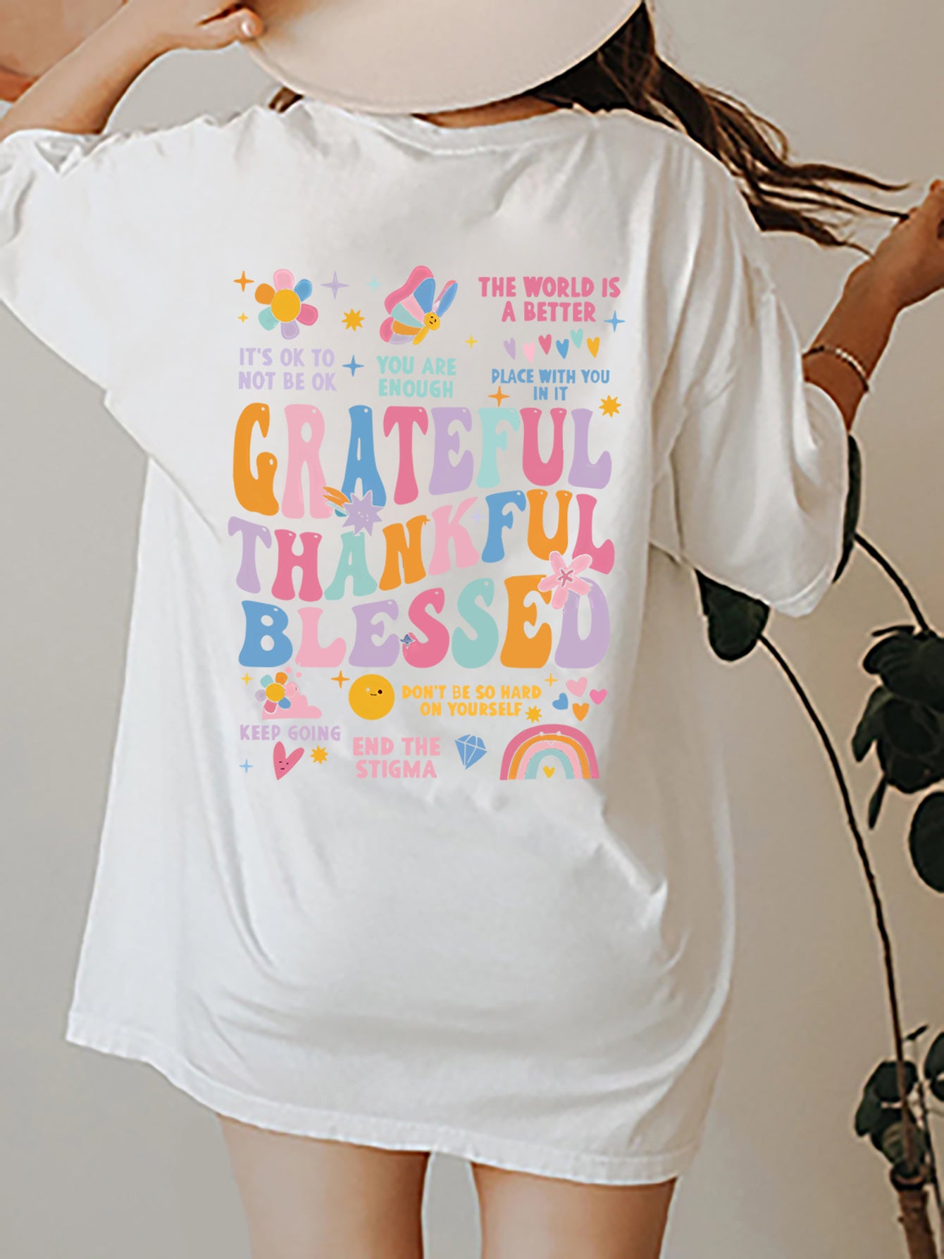 White T-shirt with colorful gratitude graphic on back