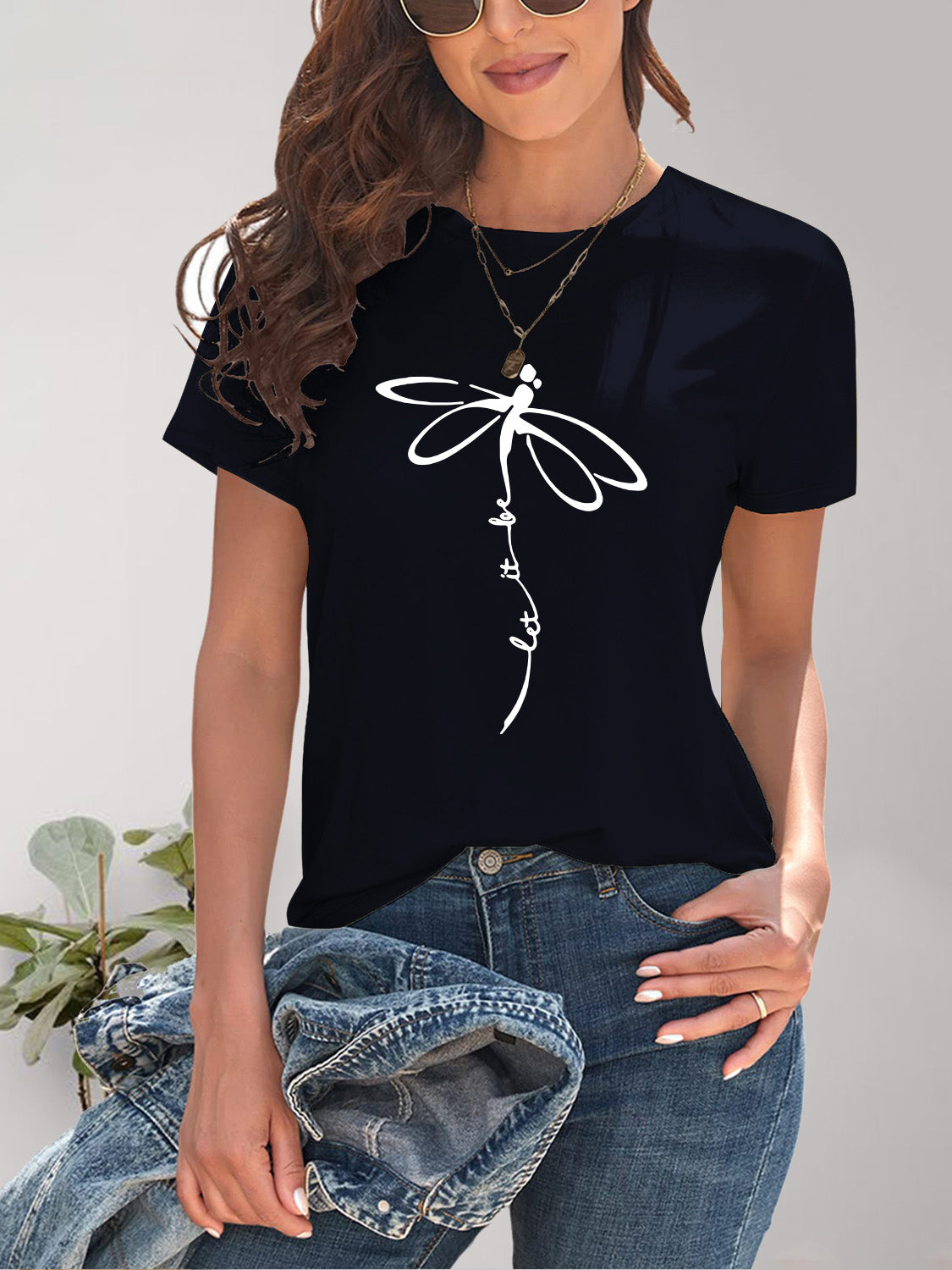 Black dragonfly graphic t-shirt with denim jacket
