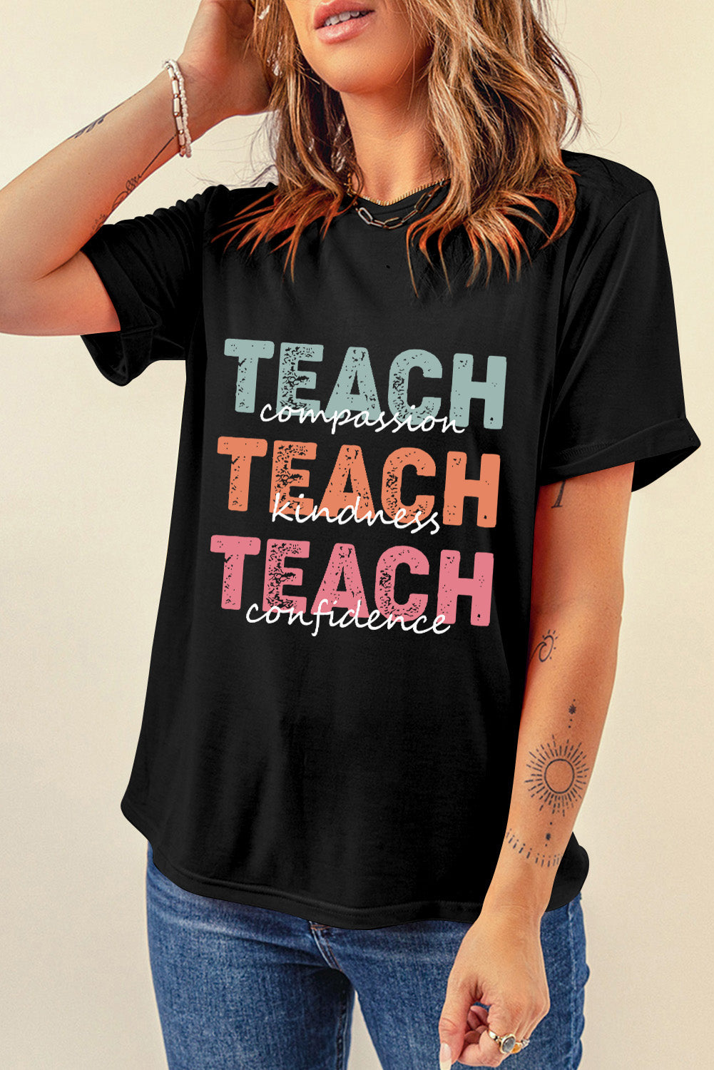 Black T-shirt displaying &