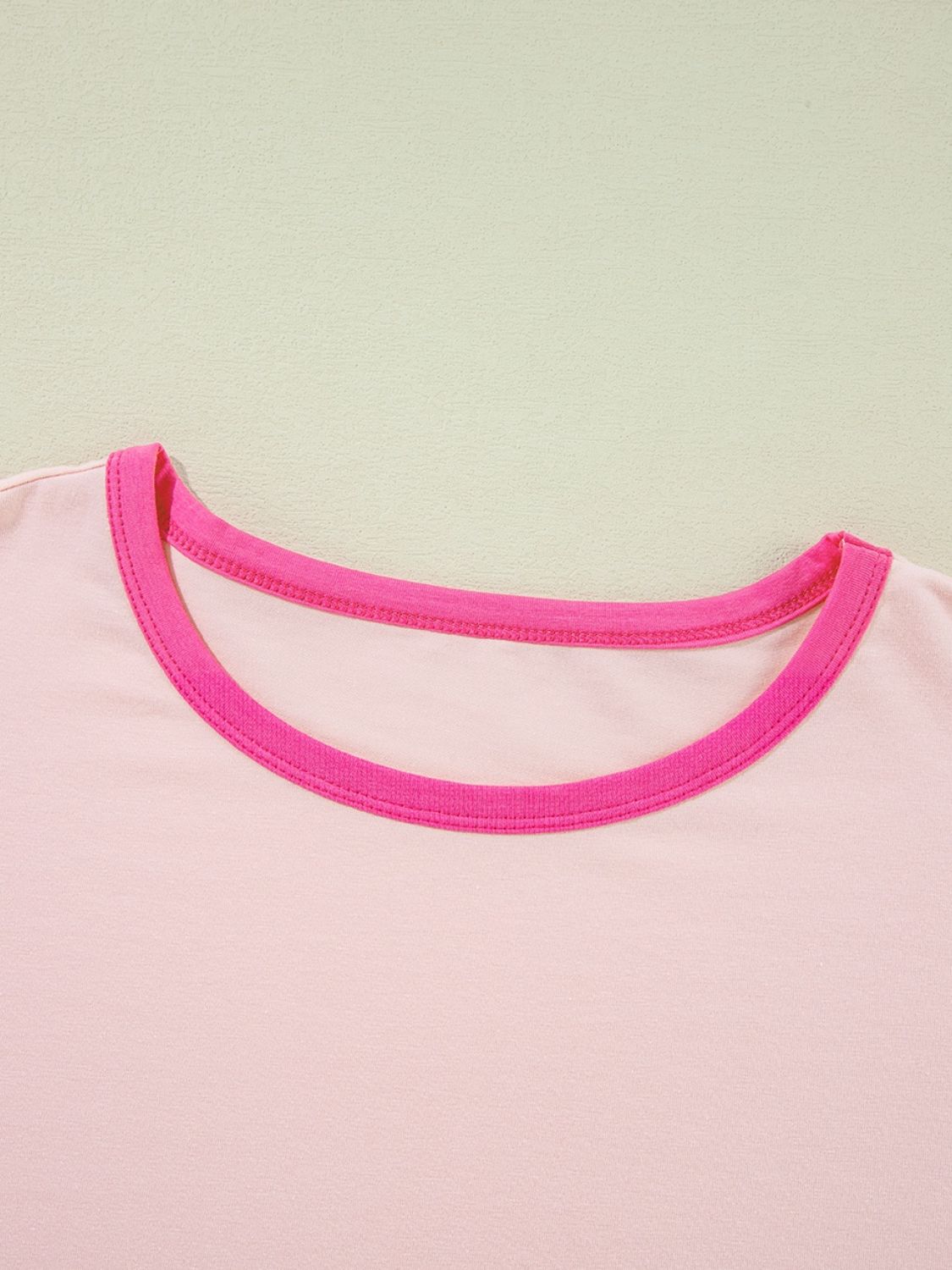 Close-up of round neck on color block T-shirt