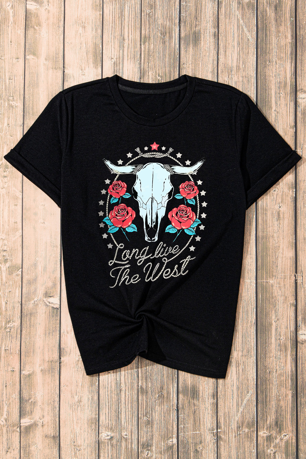 Flat lay of Western graphic T-Shirt on wood