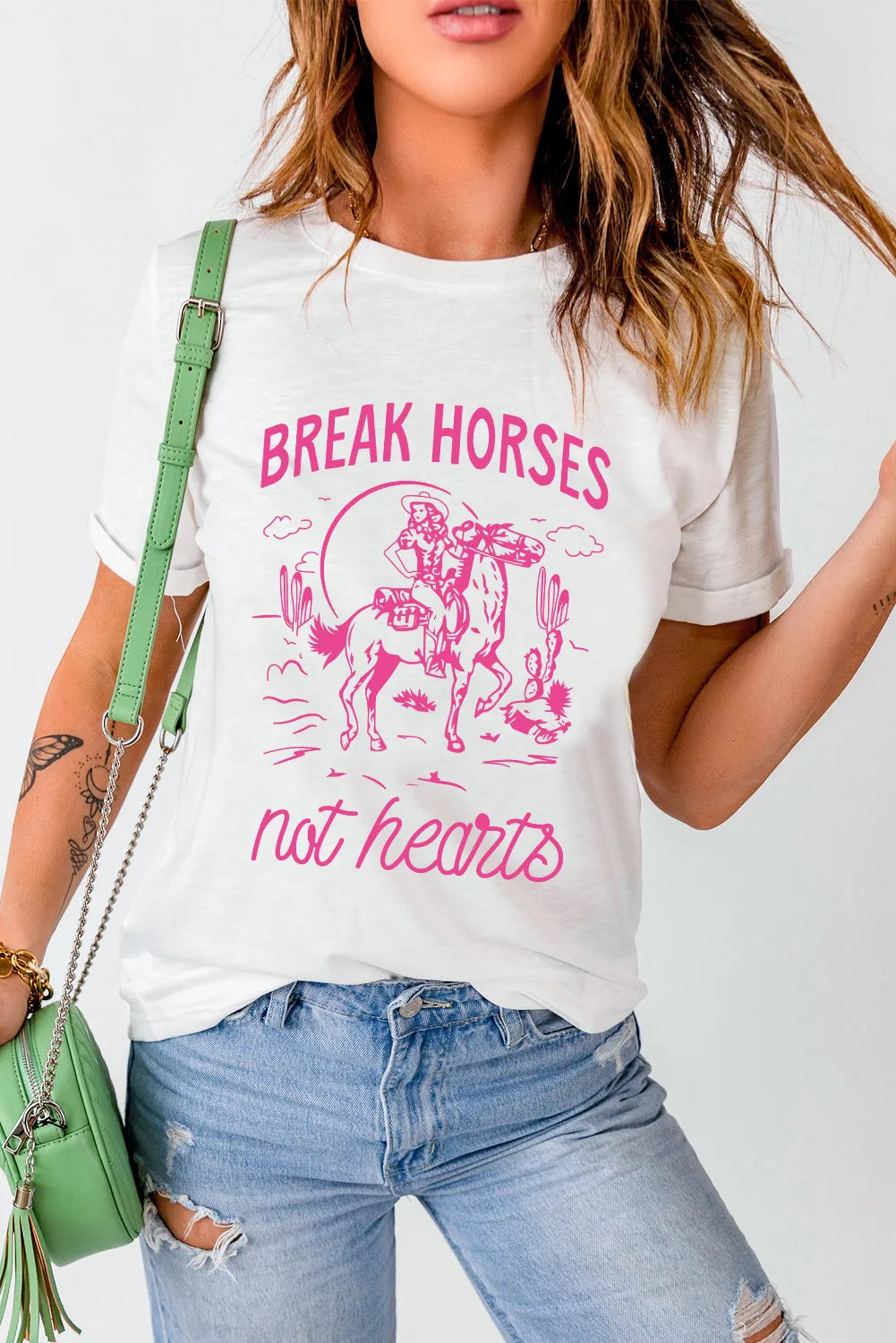 Short sleeve T-shirt with Western-themed graphic print.