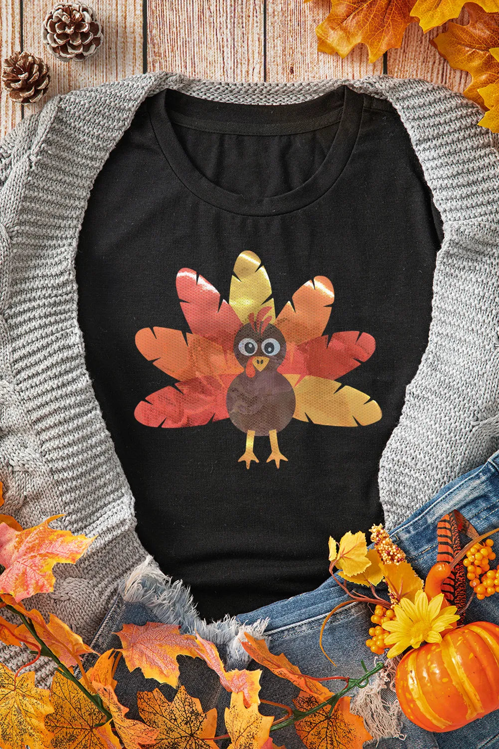 Graphic T-shirt with turkey design styled with fall decor