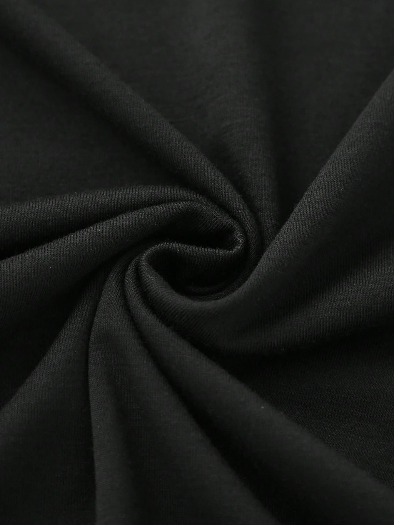 Close-up of black T-shirt fabric texture