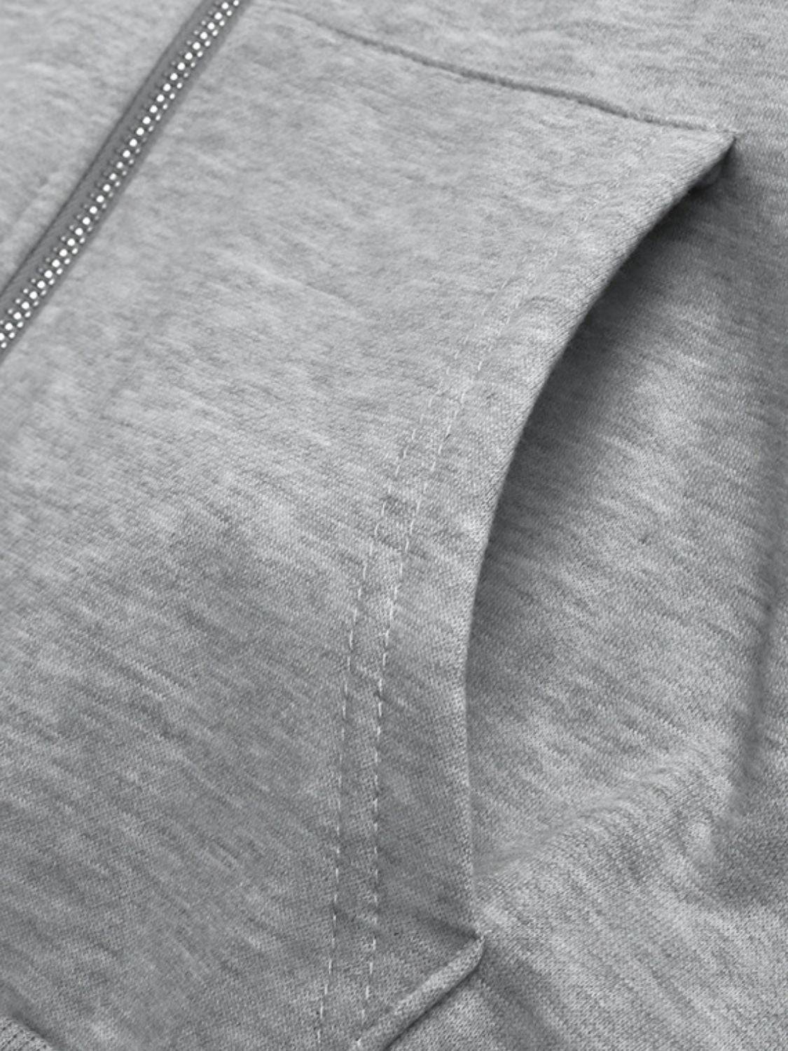 Close-up of pocket on gray hoodie