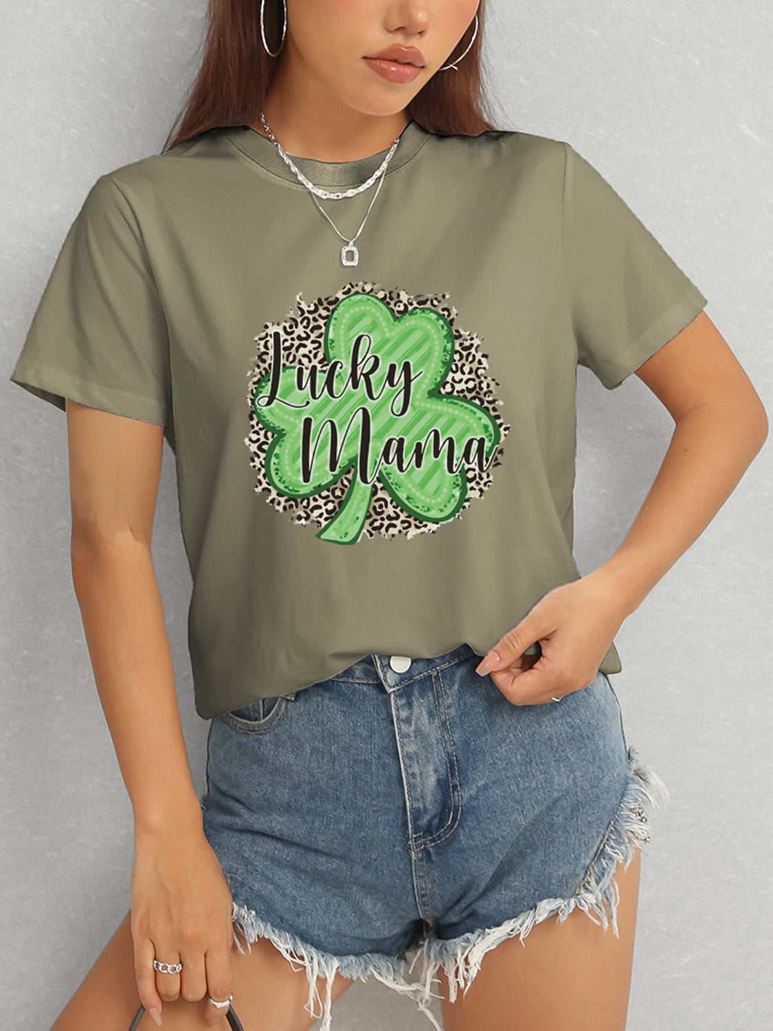 Olive green Lucky Mama t-shirt styled with shorts