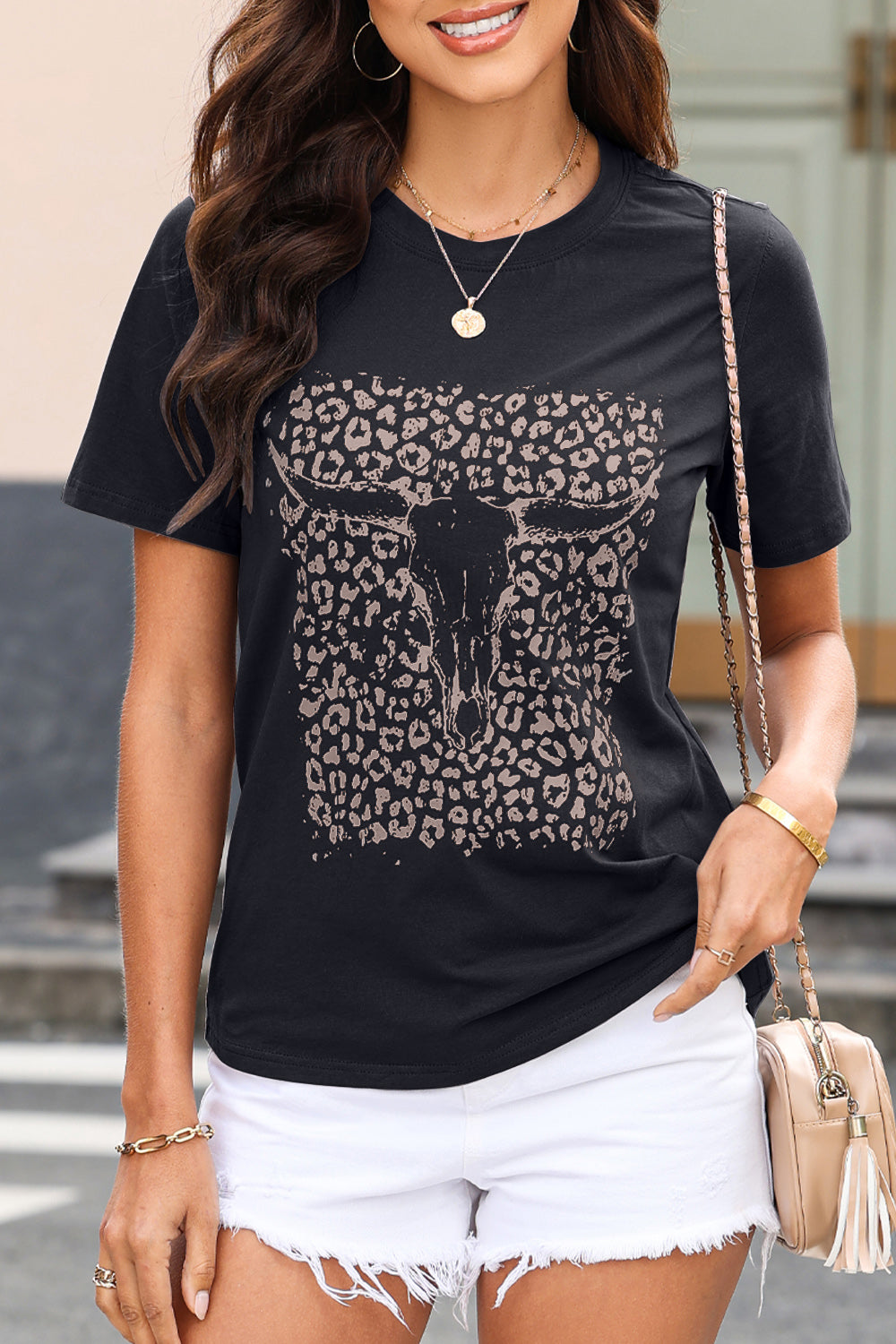 Black graphic round neck short sleeve T-shirt with bull skull design