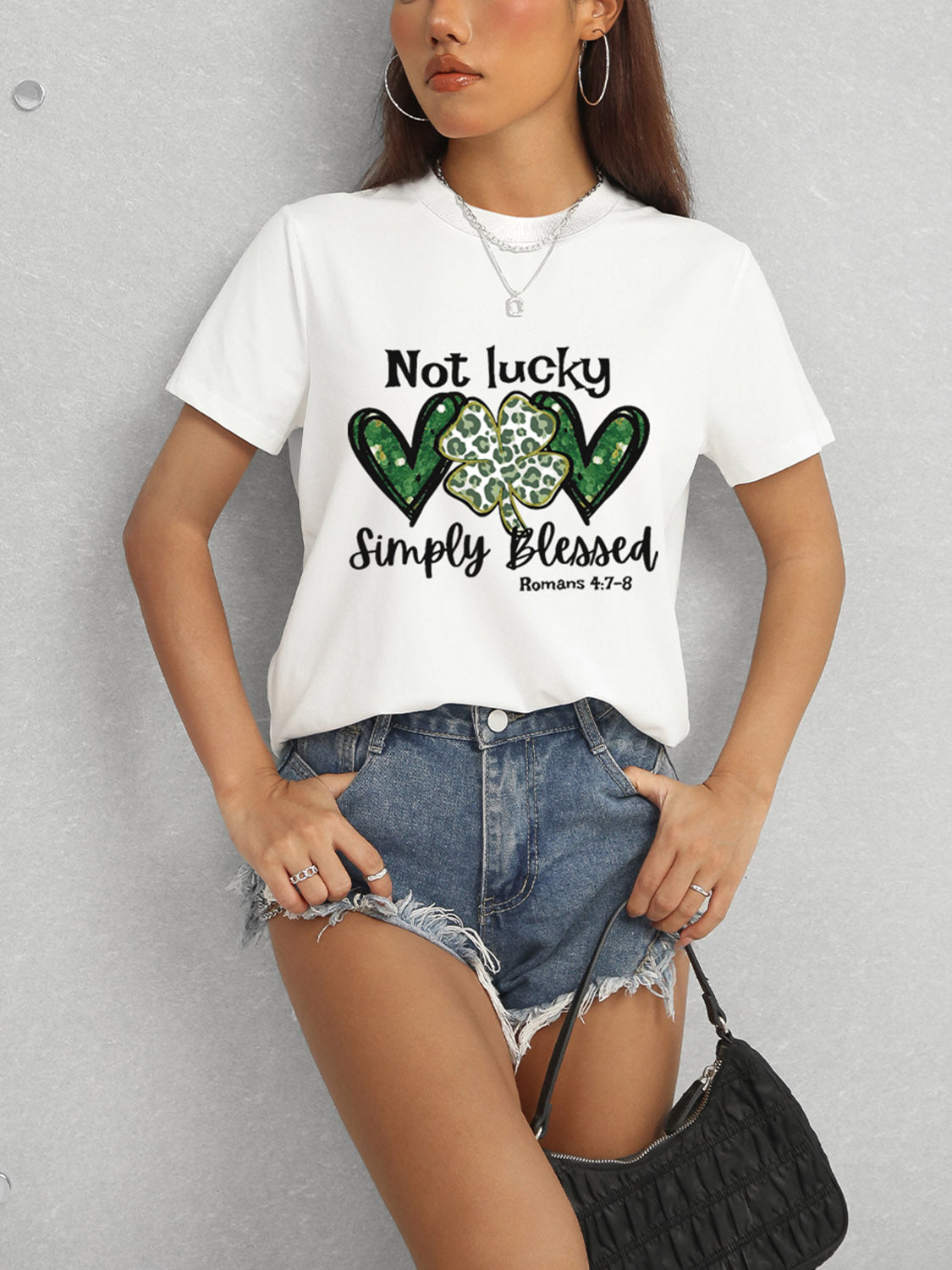 White T-shirt featuring Romans 4:7-8 text