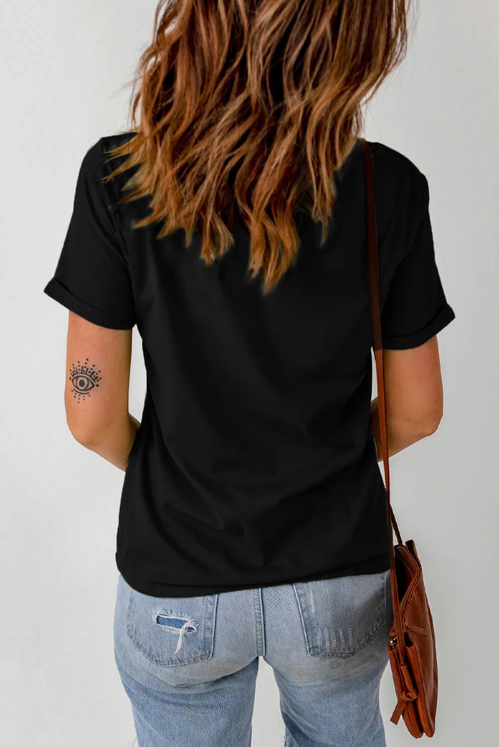 Back view of black graphic round neck short sleeve t-shirt