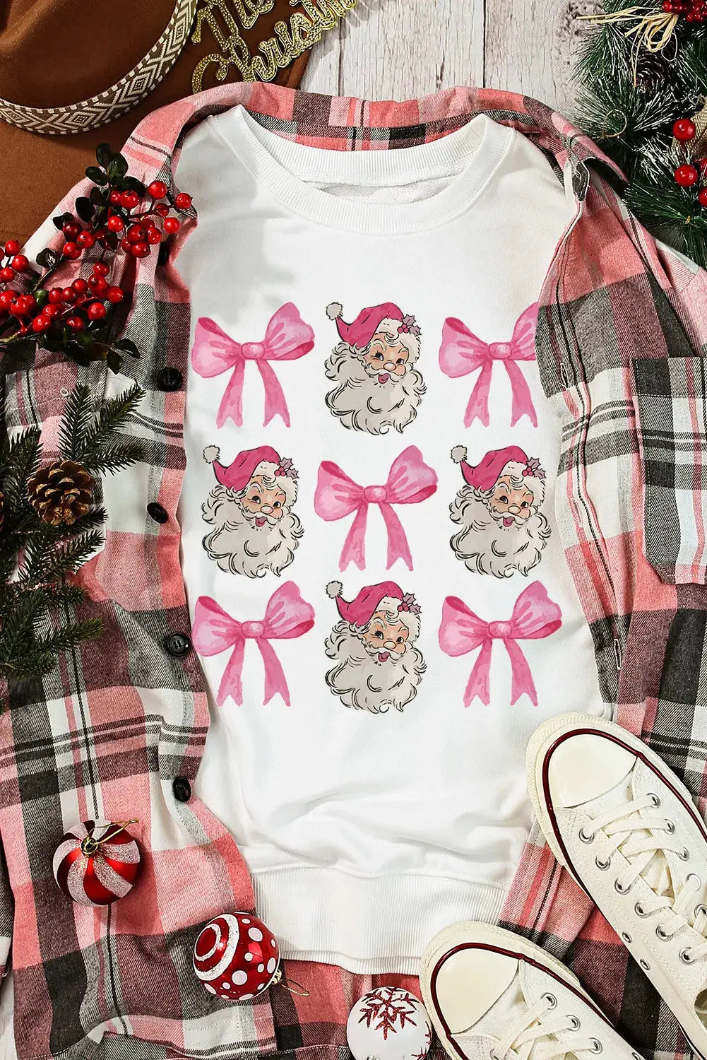 Santa & Bow graphic sweatshirt styled with plaid
