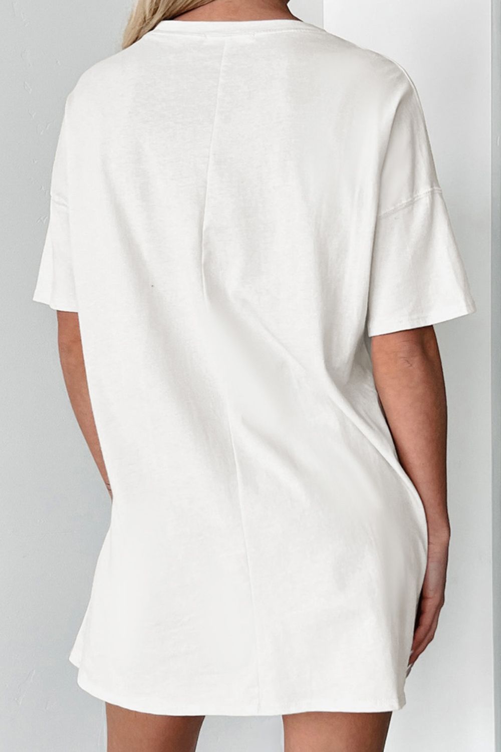 Back view of graphic round neck half sleeve t-shirt