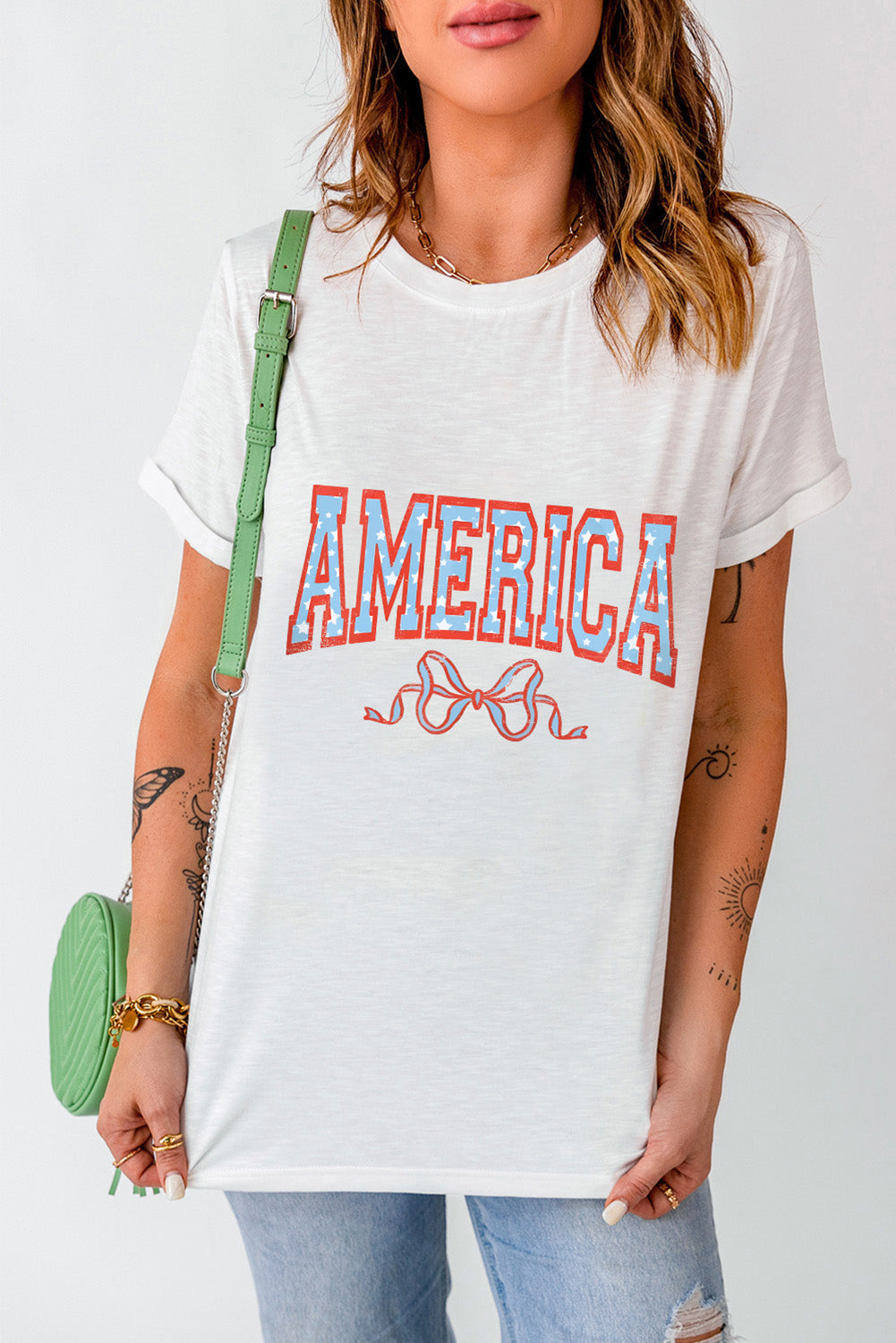 Front view of AMERICA t-shirt with bow design